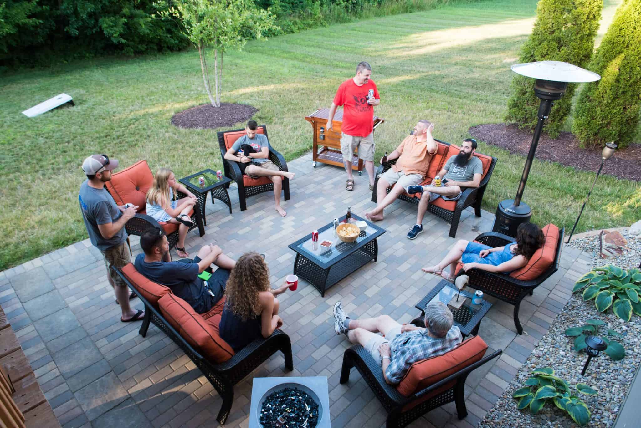 The Apex family chatting outside at the cookout