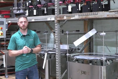 Darren Allie Stands in front of Quickship Machinery