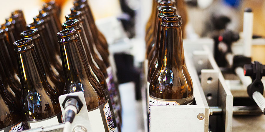 Bottles Being Added To Production Line