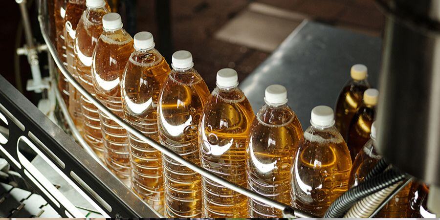 clear bottles on production line