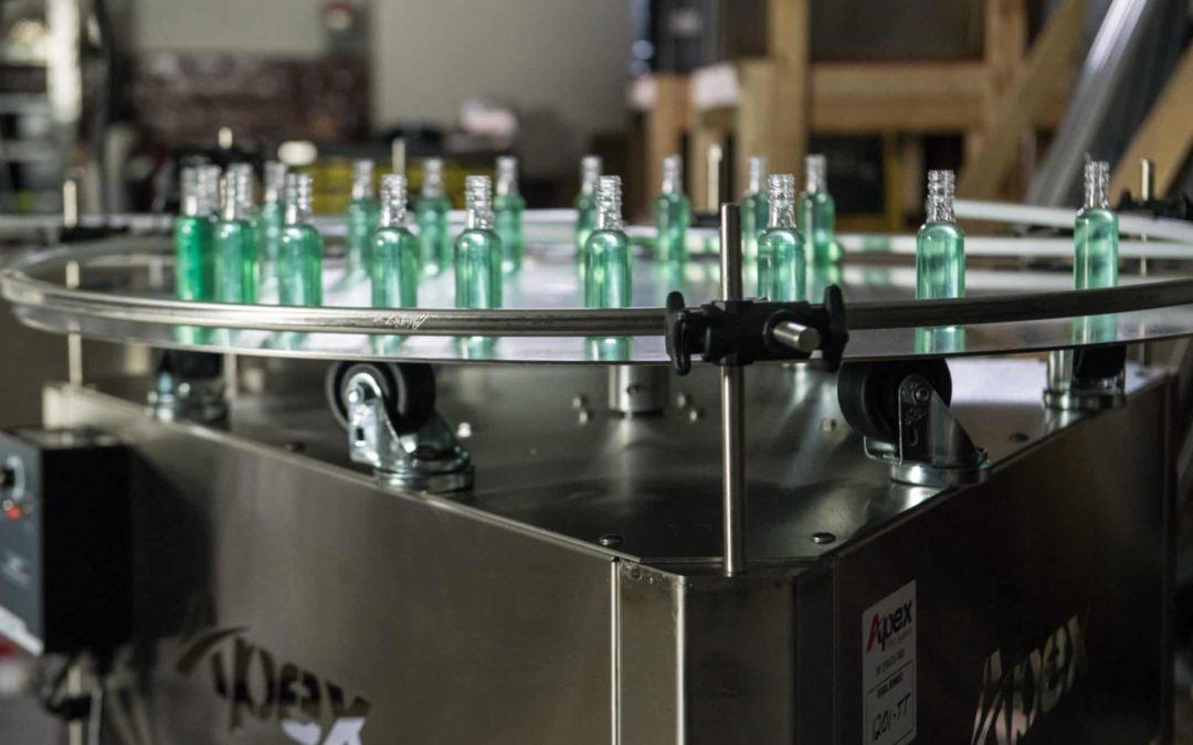 A Turntable holds bottles filled with liquid