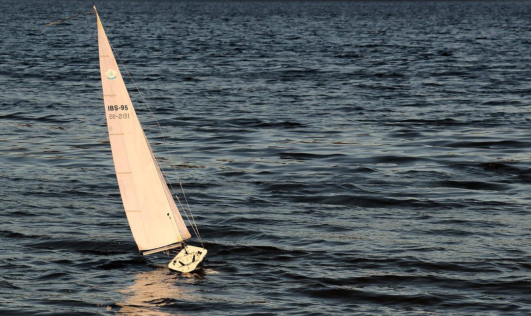 A ship being steered on the ocean