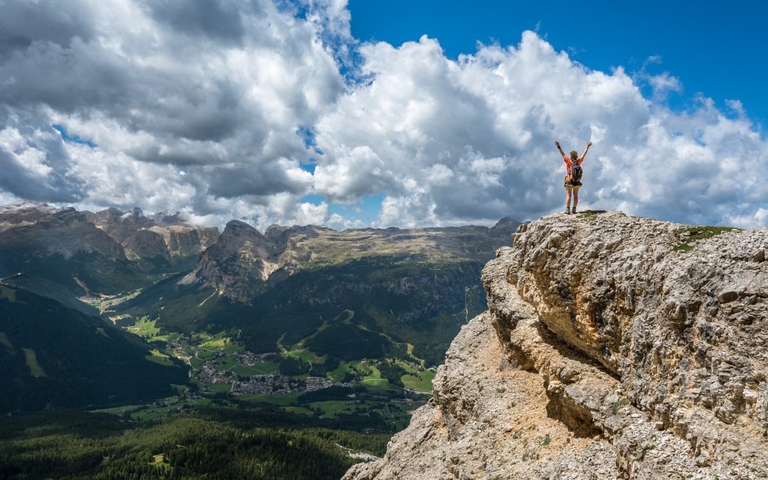 A woman who will succeed in climbing a mountain